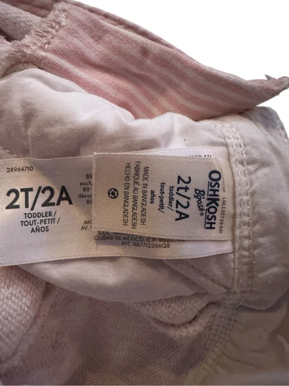 OshKosh B'gosh pink striped and denim with hearts overalls